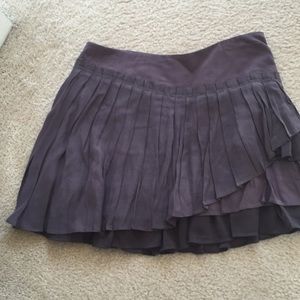 Free People ruffled mini skirt in grey.